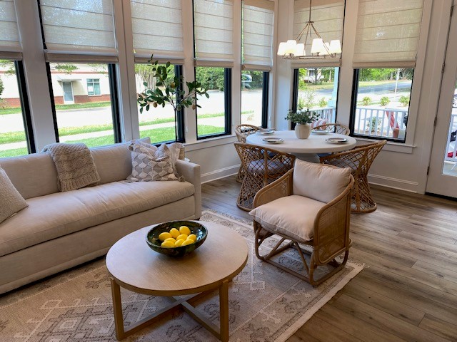 EFA Conference attendees tour the open-concept living and dining area at Symphony Park Luxury Independent Living Resort in Huntersville, N.C.